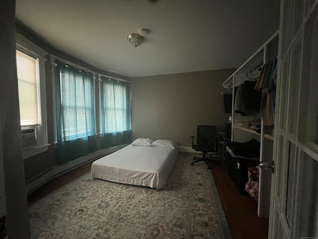 155 Summerfield Ave, Bridgeport, CT 06610 - bedroom with cooling unit and wood finished floors