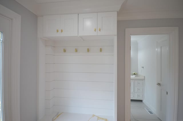 401 Unity Rd, Trumbull, CT 06611 - mudroom with baseboards and crown molding