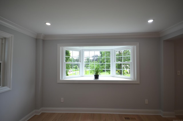 401 Unity Rd, Trumbull, CT 06611 - unfurnished room with ornamental molding, plenty of natural light, wood finished floors, and recessed lighting