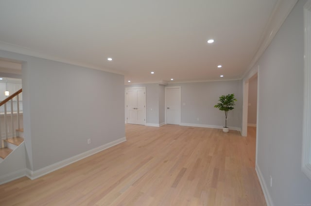401 Unity Rd, Trumbull, CT 06611 - empty room with crown molding, recessed lighting, stairway, and light wood finished floors