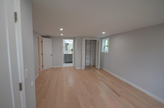 401 Unity Rd, Trumbull, CT 06611 - basement featuring light wood-type flooring and recessed lighting