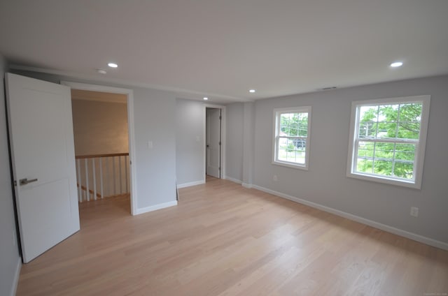 401 Unity Rd, Trumbull, CT 06611 - unfurnished bedroom with light wood-style floors and recessed lighting