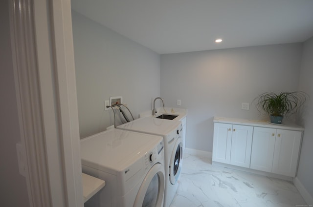 401 Unity Rd, Trumbull, CT 06611 - laundry area with separate washer and dryer, light marble finish flooring, recessed lighting, and cabinet space
