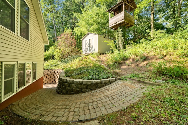 16 Lake St, Burlington, CT 06013 - view of patio featuring a storage shed