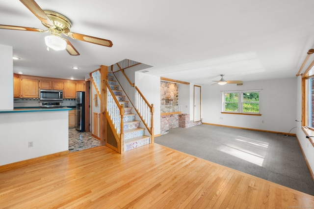16 Lake St, Burlington, CT 06013 - unfurnished living room featuring ceiling fan, light wood-type flooring, stairs, and recessed lighting