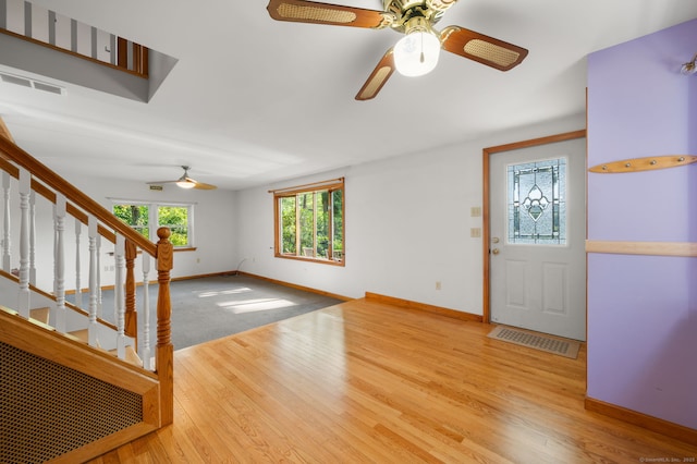 16 Lake St, Burlington, CT 06013 - entrance foyer featuring a ceiling fan, wood finished floors, and stairs
