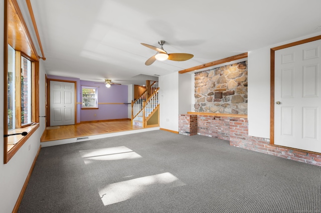 16 Lake St, Burlington, CT 06013 - unfurnished living room with carpet, ceiling fan, and stairway