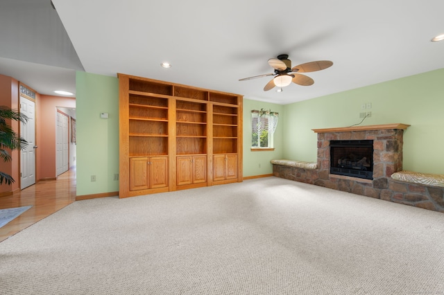 16 Lake St, Burlington, CT 06013 - unfurnished living room featuring carpet, ceiling fan, a stone fireplace, and recessed lighting