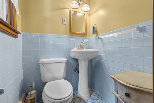 124 Pulaski Hwy, Ansonia, CT 06401 - half bath featuring wainscoting, tile walls, and tile patterned flooring