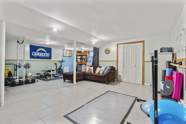 124 Pulaski Hwy, Ansonia, CT 06401 - exercise room with light tile patterned floors and vaulted ceiling