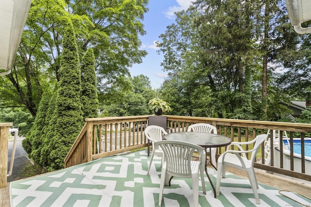 124 Pulaski Hwy, Ansonia, CT 06401 - deck with outdoor dining space and an outdoor pool