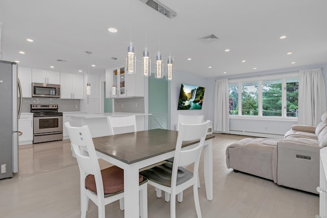 37 Cedar Ln, Beacon Falls, CT 06403 - dining area featuring a baseboard radiator and recessed lighting