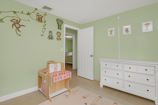 37 Cedar Ln, Beacon Falls, CT 06403 - bedroom with light wood-type flooring and baseboards
