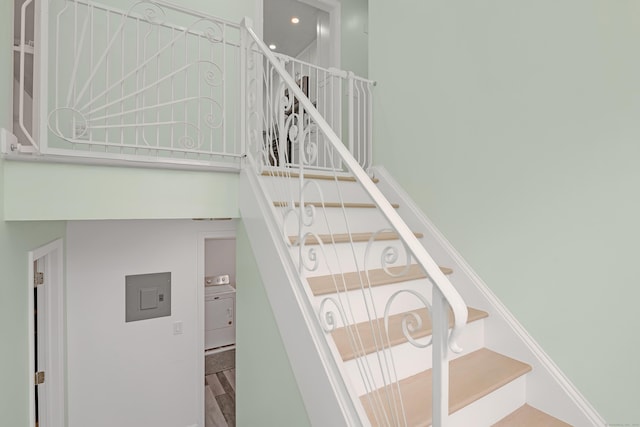37 Cedar Ln, Beacon Falls, CT 06403 - stairway with electric panel and wood finished floors