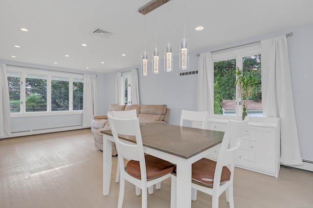 37 Cedar Ln, Beacon Falls, CT 06403 - dining area featuring light wood-style flooring, recessed lighting, and a baseboard heating unit