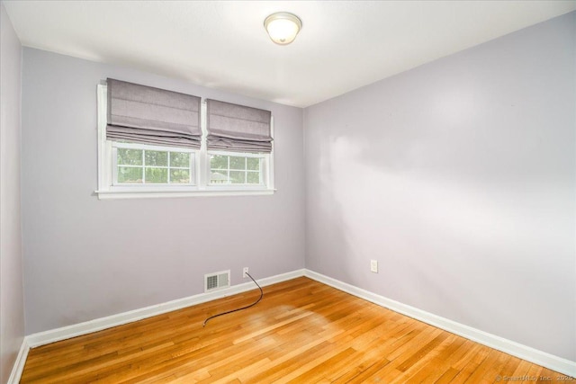 234 Forest Dr, Wethersfield, CT 06109 - empty room with baseboards and wood finished floors