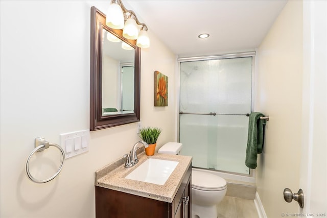 234 Forest Dr, Wethersfield, CT 06109 - bathroom featuring vanity, an enclosed shower, and recessed lighting