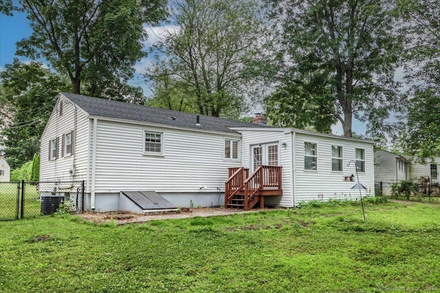 234 Forest Dr, Wethersfield, CT 06109 - rear view of property featuring a chimney