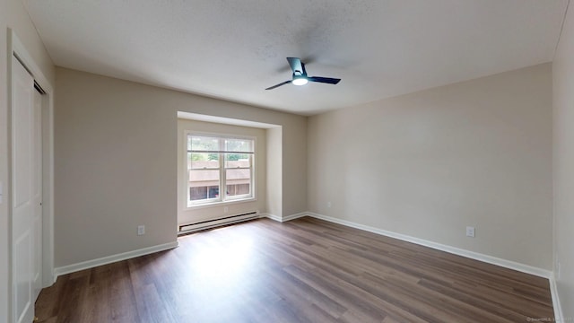 10 Cianci Ave Apt 9, Plainville, CT 06062 - unfurnished bedroom with a baseboard heating unit, dark wood-style floors, ceiling fan, and a closet