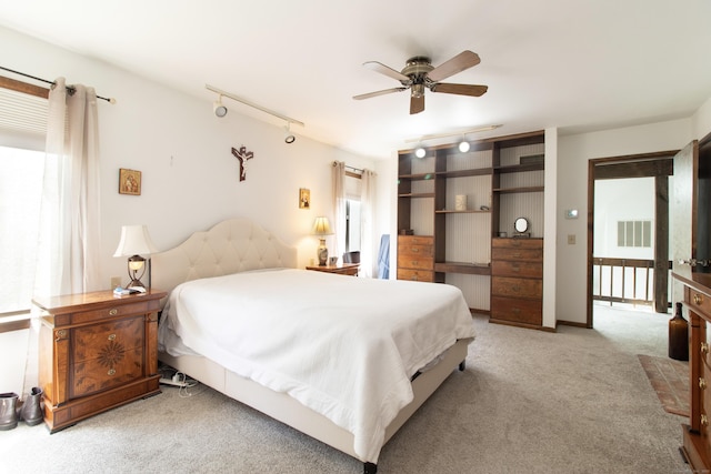 22 Ledgewood Rd, Redding, CT 06896 - bedroom with track lighting, light carpet, and ceiling fan