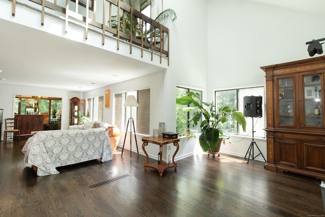 22 Ledgewood Rd, Redding, CT 06896 - living area with plenty of natural light, dark wood-style floors, and a towering ceiling
