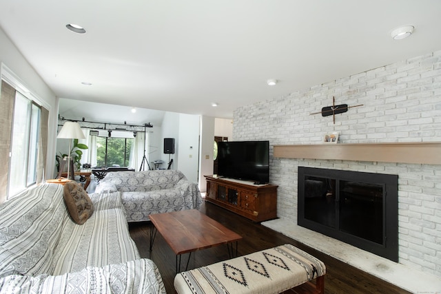 22 Ledgewood Rd, Redding, CT 06896 - living area featuring wood finished floors and a brick fireplace