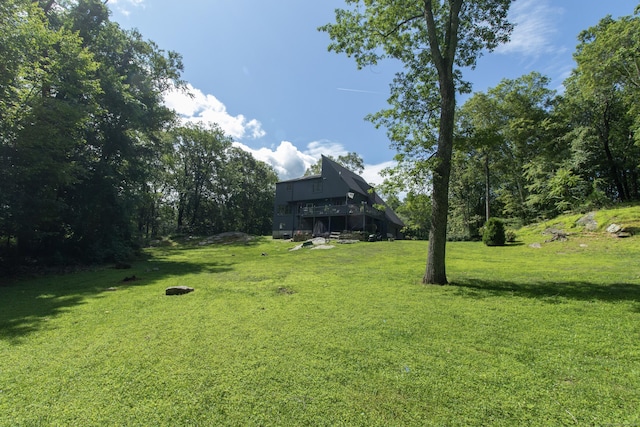 22 Ledgewood Rd, Redding, CT 06896 - view of green lawn with a wooden deck