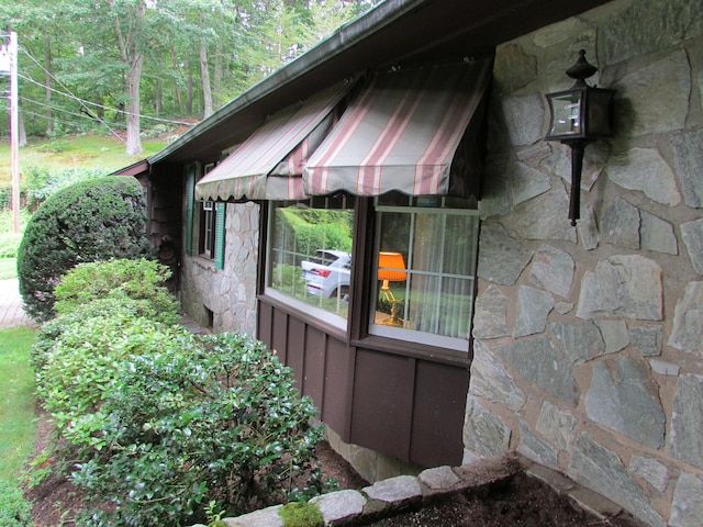 view of home's exterior featuring stone siding