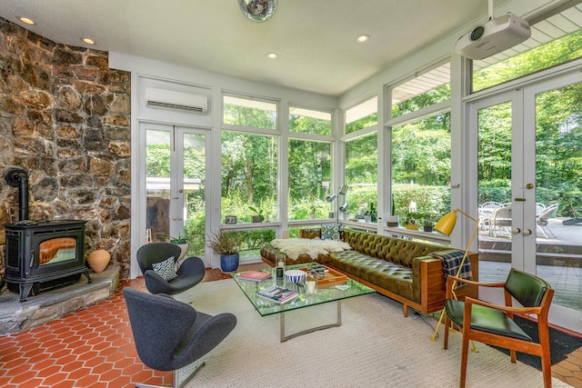 96 Sherman Rd, New Milford, CT 06776 - sunroom / solarium with french doors, a wall mounted air conditioner, a wood stove, and recessed lighting