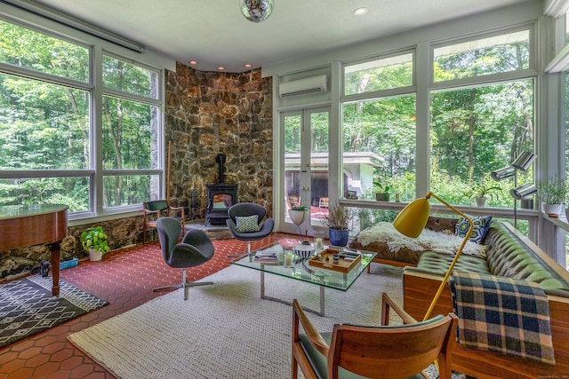 96 Sherman Rd, New Milford, CT 06776 - sunroom with french doors, an AC wall unit, a wood stove, healthy amount of natural light, and recessed lighting