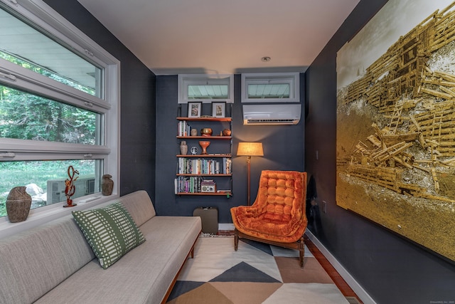 96 Sherman Rd, New Milford, CT 06776 - sitting room featuring a wall mounted air conditioner and baseboards