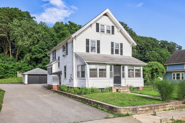 36 School St, Killingly, CT 06239 - view of front of home featuring an outdoor structure, a detached garage, and a front yard