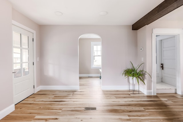 36 School St, Killingly, CT 06239 - entryway featuring arched walkways and light wood-style floors