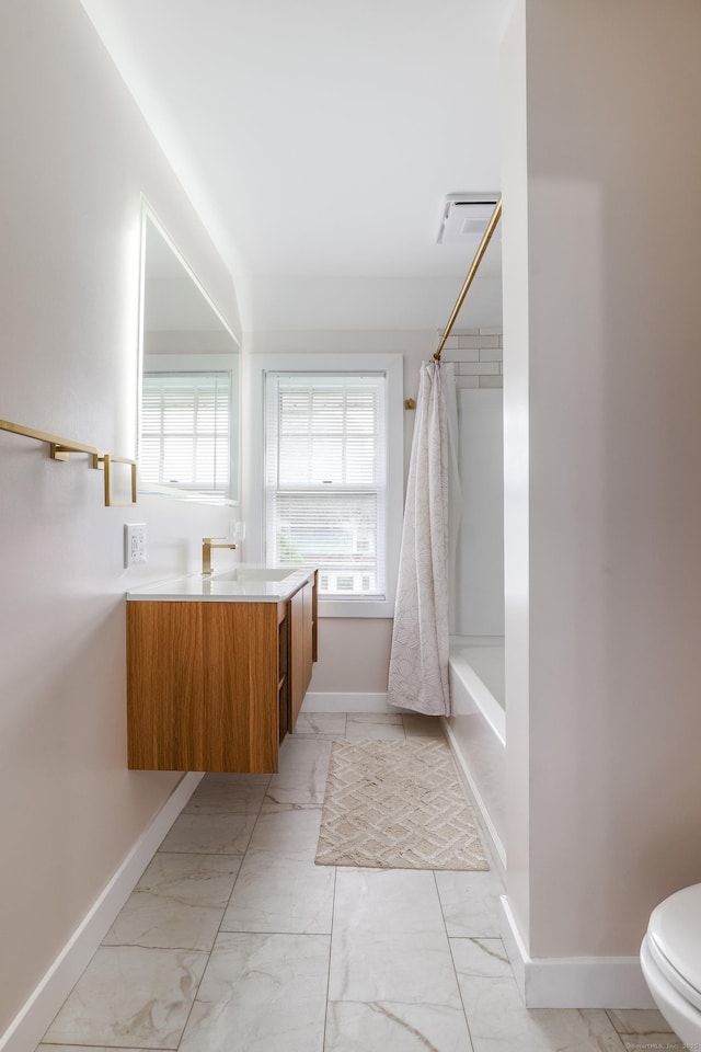 36 School St, Killingly, CT 06239 - full bathroom with marble look tile flooring, vanity, plenty of natural light, and shower / bath combination with curtain