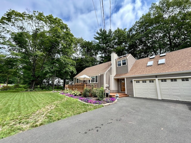 38 Tanglewood Rd, Farmington, CT 06032 - view of front of home featuring a garage, driveway, a front yard, a wooden deck, and a chimney