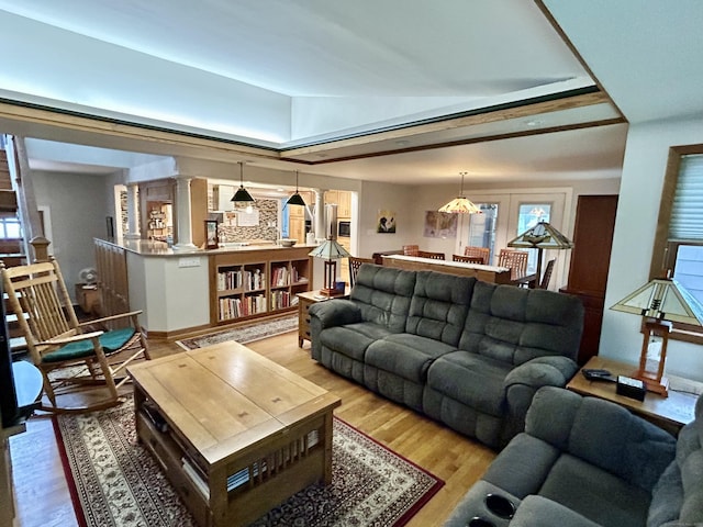 38 Tanglewood Rd, Farmington, CT 06032 - living area with wood finished floors and healthy amount of natural light