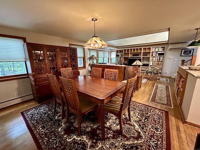 38 Tanglewood Rd, Farmington, CT 06032 - dining area with wood finished floors and baseboard heating