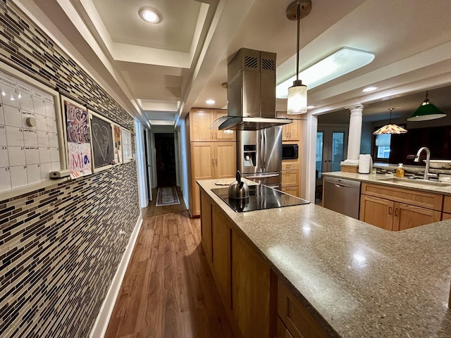 38 Tanglewood Rd, Farmington, CT 06032 - kitchen featuring black appliances, island exhaust hood, decorative columns, dark wood-style flooring, and hanging light fixtures