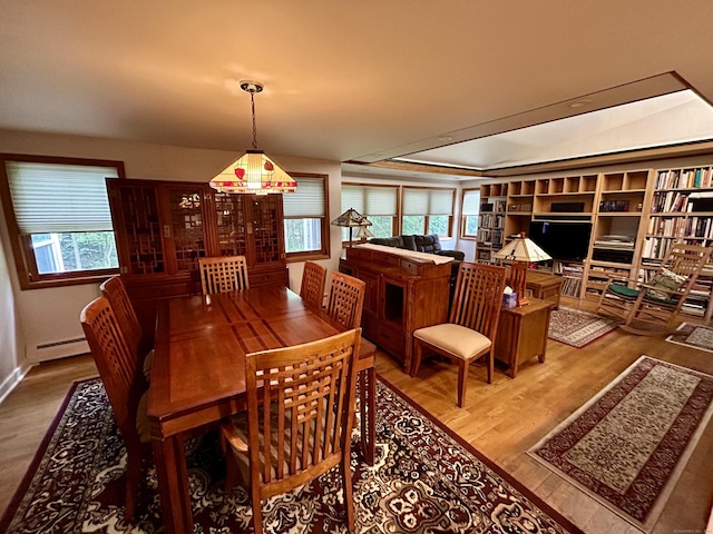 38 Tanglewood Rd, Farmington, CT 06032 - dining room with a baseboard radiator, wood finished floors, and plenty of natural light