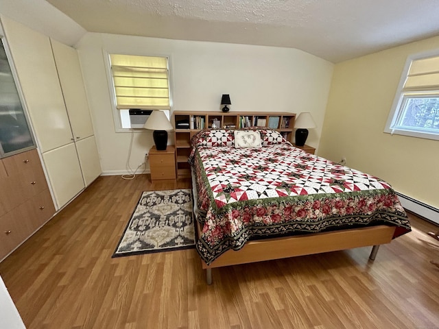 38 Tanglewood Rd, Farmington, CT 06032 - bedroom featuring wood finished floors, cooling unit, and vaulted ceiling