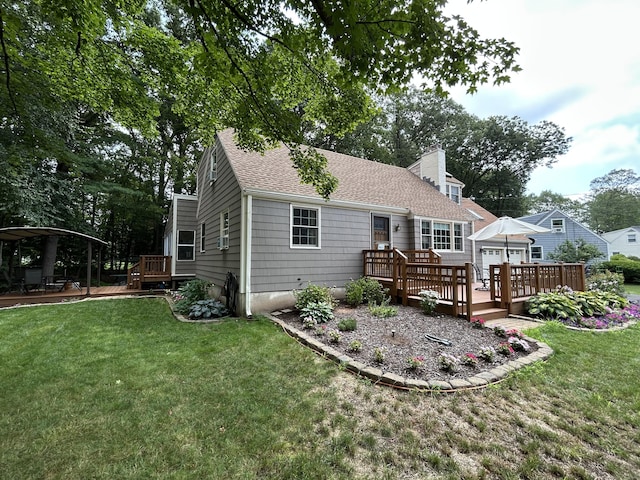38 Tanglewood Rd, Farmington, CT 06032 - rear view of property with a deck, a lawn, a chimney, and roof with shingles
