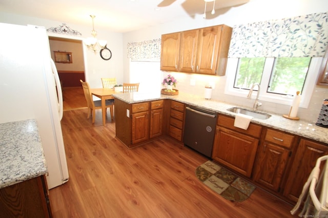 46 Ryan Rd, Tolland, CT 06084 - kitchen with stainless steel dishwasher, freestanding refrigerator, light wood-style floors, a peninsula, and ceiling fan
