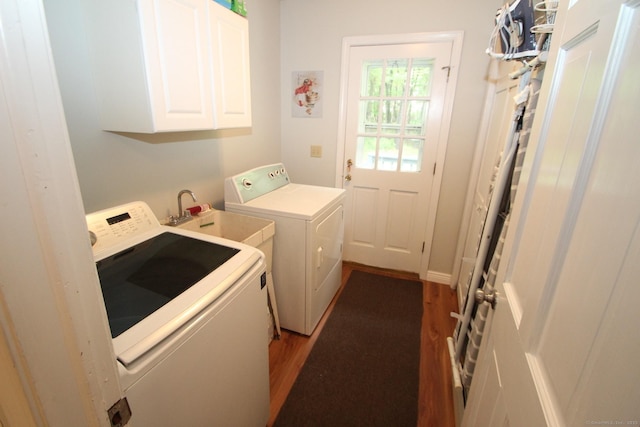 46 Ryan Rd, Tolland, CT 06084 - washroom with cabinet space, wood finished floors, and separate washer and dryer
