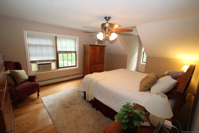 46 Ryan Rd, Tolland, CT 06084 - bedroom with a baseboard radiator, multiple windows, cooling unit, and light wood-style flooring