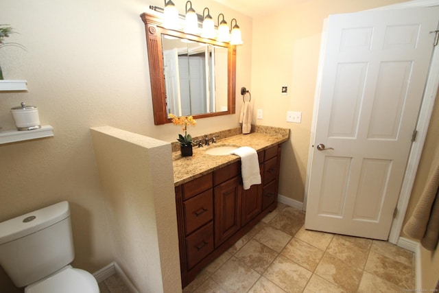 46 Ryan Rd, Tolland, CT 06084 - bathroom featuring vanity and toilet