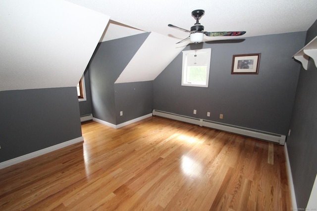 46 Ryan Rd, Tolland, CT 06084 - bonus room featuring a baseboard heating unit, ceiling fan, wood finished floors, and lofted ceiling