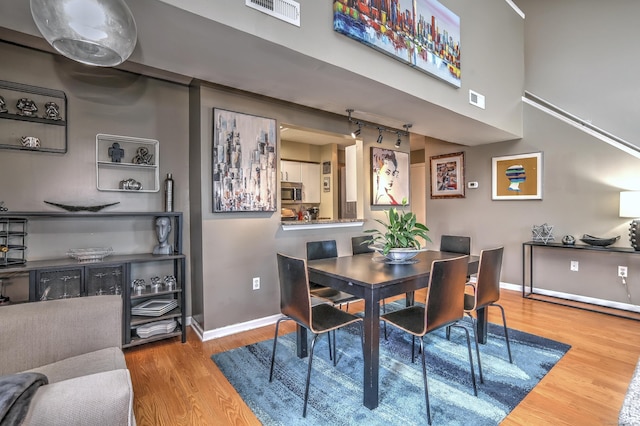 685 Quinnipiac Ave Unit 685, New Haven, CT 06513 - dining area featuring wood finished floors and baseboards