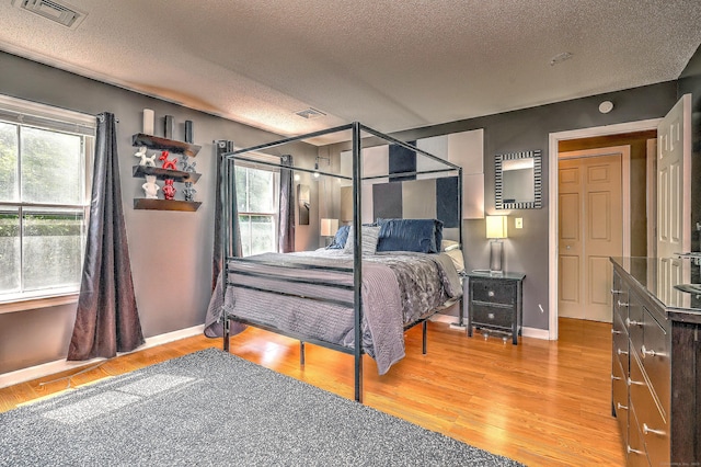 685 Quinnipiac Ave Unit 685, New Haven, CT 06513 - bedroom featuring a textured ceiling and wood finished floors