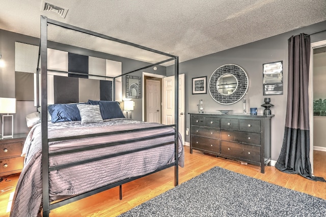 685 Quinnipiac Ave Unit 685, New Haven, CT 06513 - bedroom featuring wood finished floors and a textured ceiling