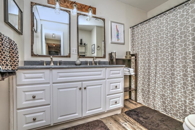 685 Quinnipiac Ave Unit 685, New Haven, CT 06513 - full bath with double vanity, wood finished floors, and a shower with shower curtain
